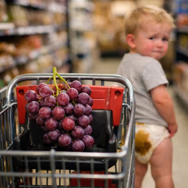 Naked Fruit on the Seat of a Grocery Cart